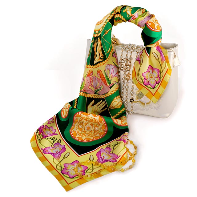 Create a touch of cosmic enigma with deep emeralds and rich greens of the Emerald Sky pure silk scarf by PSICHORA.