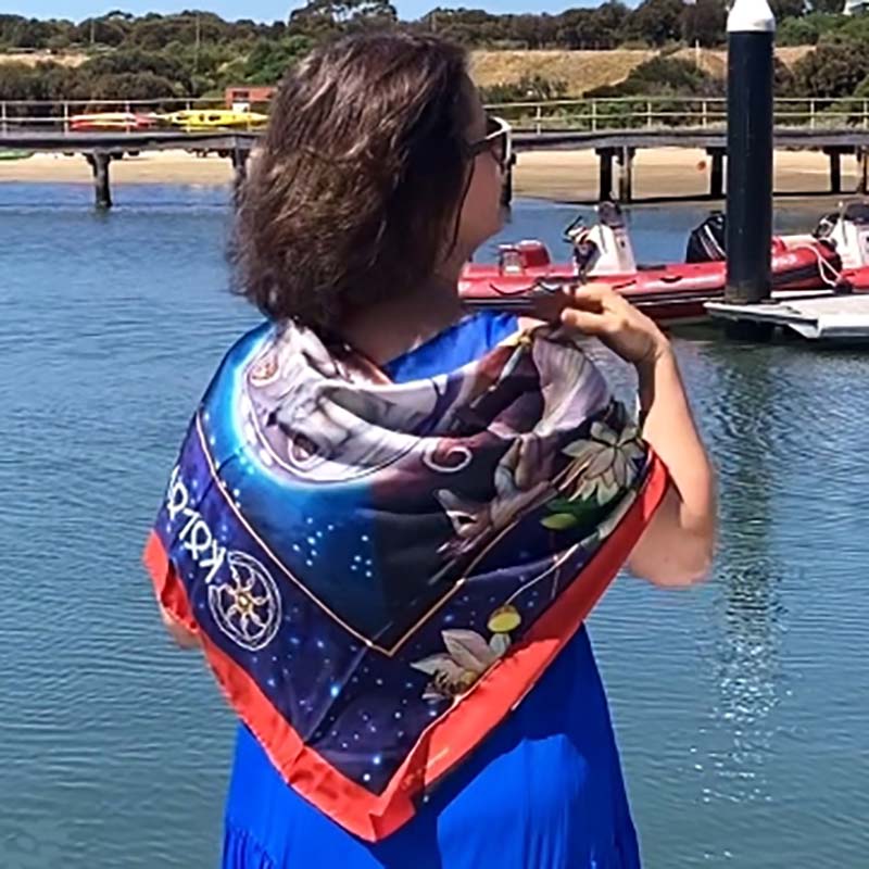 PSICHORA: wearing the Arrival silk scarf during sunny outdoors.