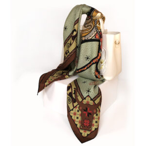 Wear the Taurus Terracotta Olive Green Silk Scarf with intention. Wrap it around your neck, drape it over your shoulders, tie it in your hair, or carry it as part of your daily ritual.