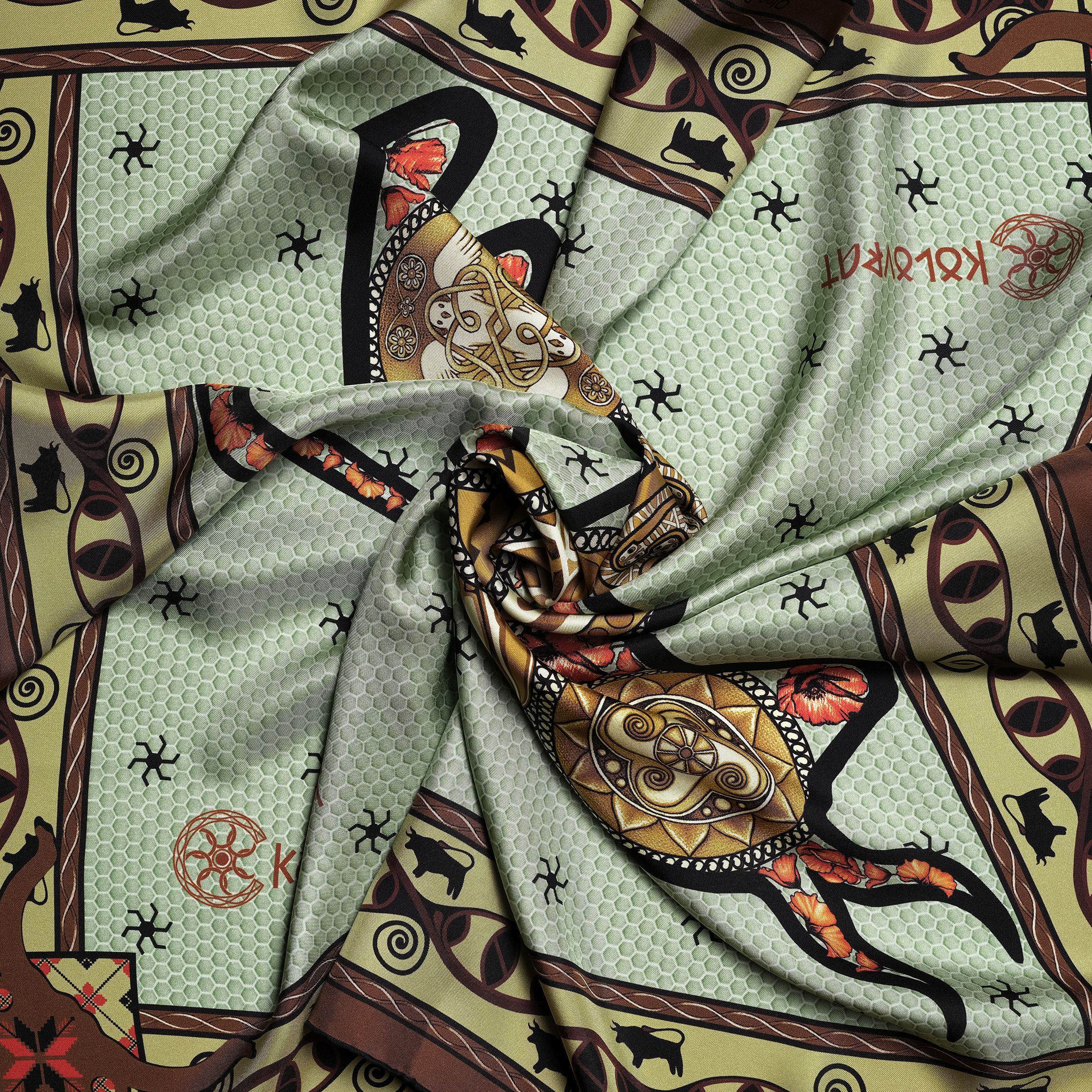 Feel the grounded strength with the Taurus terracotta olive silk scarf. Designed in AU & made in Italy, this scarf places the Trypillian bull at its centre — a symbol of endurance, protection, and fertile life‑force.