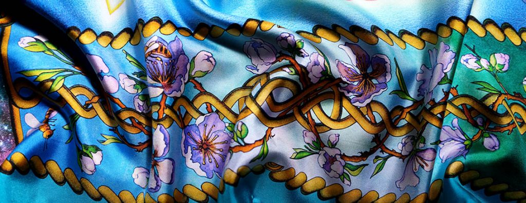 Designed in Australia the Creation N5 pure silk scarf in teal blue. Closeup.