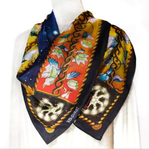 Designed in Australia and made in China the Creation reversible silk scarf 88cm by PSICHORA. Black, red, amber, emerald, blue, celestial, floral.