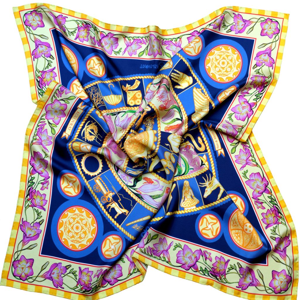 The Night Sky designer blue silk scarf blends golden celestial wheals of Zodiac & Nakshatras, pink florals and telling imagery with the rich blues of deep Space in a luminous, cosmos‑inspired design. Designed in Australia and made in Italy, this PSICHORA piece brings a refined statement piece to your look.