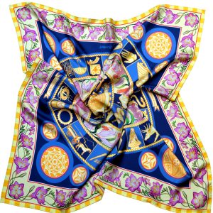 The Night Sky designer blue silk scarf blends golden celestial wheals of Zodiac & Nakshatras, pink florals and telling imagery with the rich blues of deep Space in a luminous, cosmos‑inspired design. Designed in Australia and made in Italy, this PSICHORA piece brings a refined statement piece to your look.