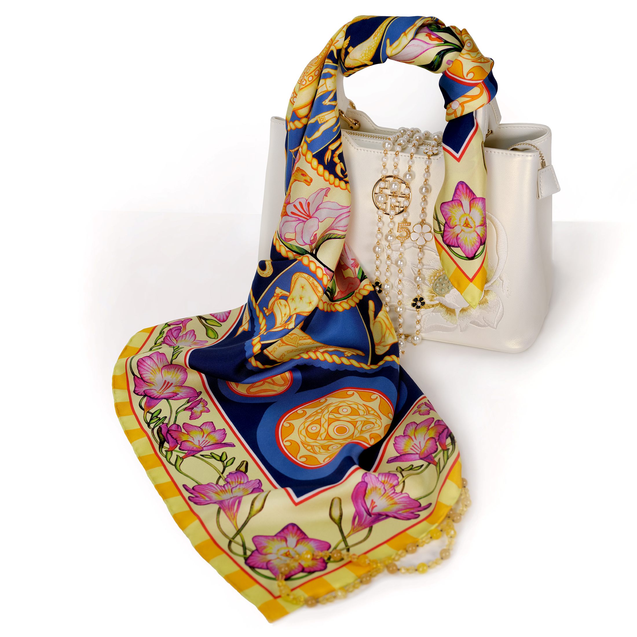 The Night Sky royal blue silk scarf combines golden celestial wheals of Zodiac & Nakshatras, pink florals and telling imagery with royal blues of deep Space in a luminous, cosmos‑inspired design. Designed in Australia and made in Italy, this PSICHORA piece brings a refined statement piece to your look.