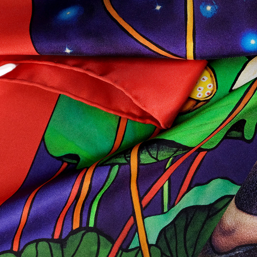 A closeup view of the Orion luxury silk scarf by PSICHORA.