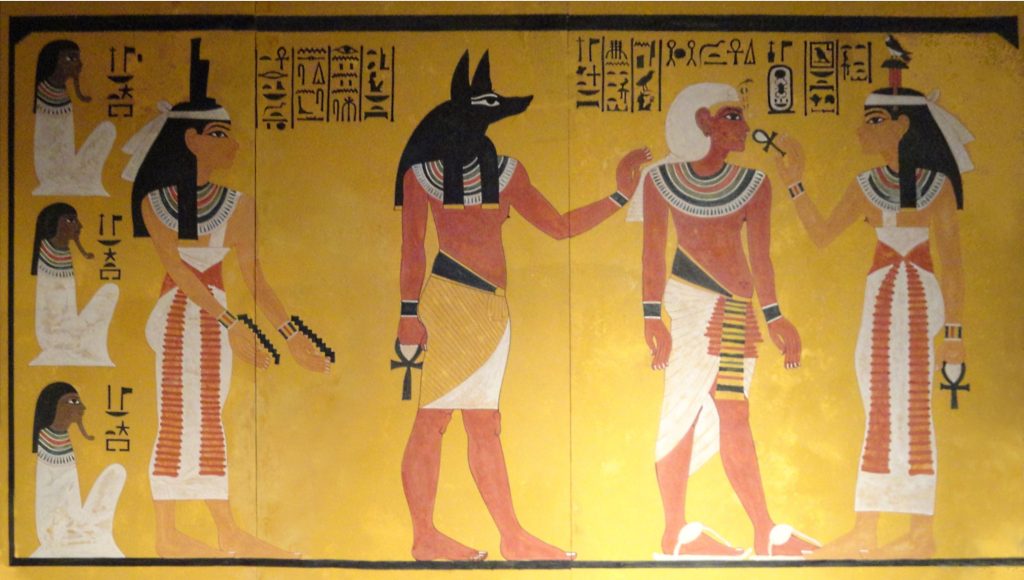 The goddess Hathor and the God Anubis holding Ankh symbols.