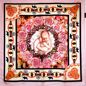 The Beginning luxury silk scarf invites the gentle energy of renewal and ancestral memory. Created in Australia and crafted by hand in Italy, it folds pale pink, amber, and terracotta hues around Trypillian bull and DNA symbols, blooming peonies, and the tender nested baby. A PSICHORA piece that carries the warmth of Spring light and the timeless rhythm of beginnings.