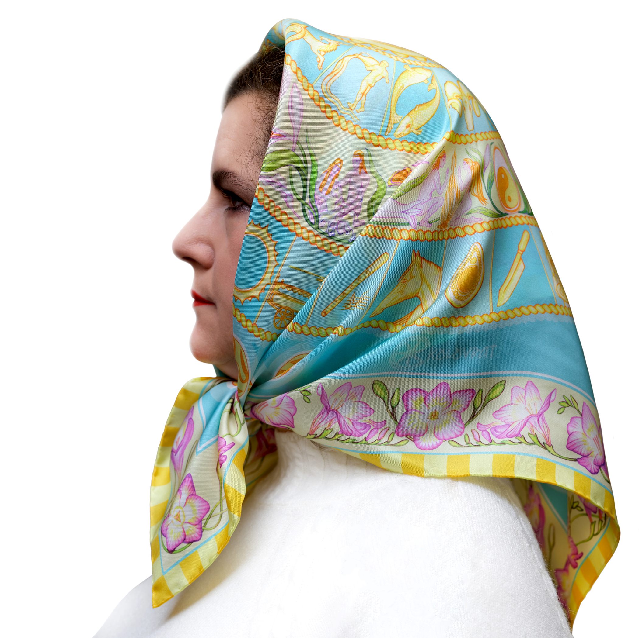 Designed in Australia, the Turquoise Sky luxury silk scarf 68cm combines golden celestial imagery with tender pink florals and telling imagery over turquoise colour of sunlit sky. Made in Italy, this PSICHORA piece brings naturally splendid sky‑inspired elegance to your look.