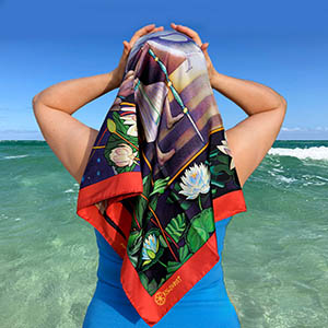On vocation with the Orion luxury silk scarf 90cm - red navy blue emerald floral - by PSICHORA. Designed in Melbourne , made in Italy.