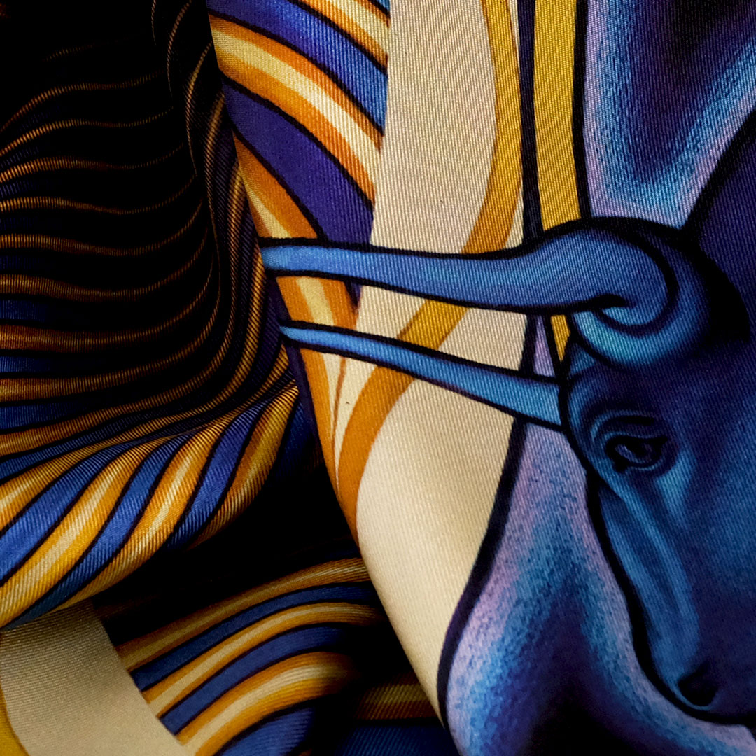 A closeup view of the Cosmic Creation pure silk scarf 90cm by PSICHORA.