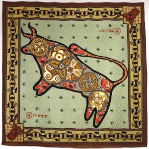 Step into grounded strength with the Taurus terracotta olive silk scarf 90cm. Designed in AU & made in Italy, this scarf places the Trypillian bull at its centre — a symbol of power, protection, and fertile life‑force.
